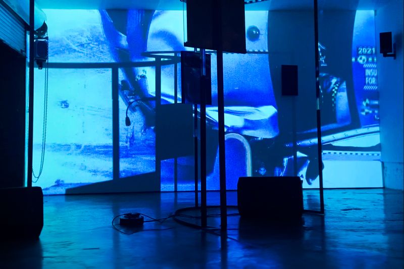 Installation overview of Love letters event large projection on wall